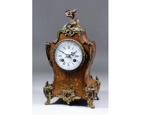 A late 19th Century French rosewood marquetry and gilt brass mounted mantel clock of Louis XV design, by A.D. Mougin, No. 572