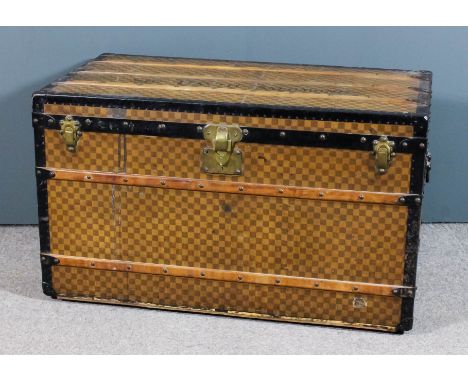 A large 19th Century Louis Vuitton cabin trunk, 40.5ins x 22.75ins x 23.75ins, the ends with carrying handles, and with plate