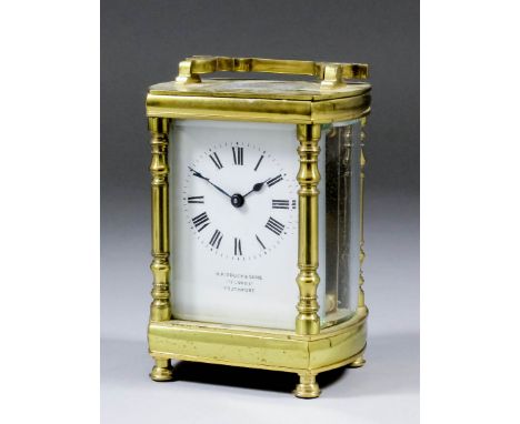 An early 20th Century French carriage clock retailed by H. Pidduck and Sons, 175 Lord Street, Southport, the white enamel dia