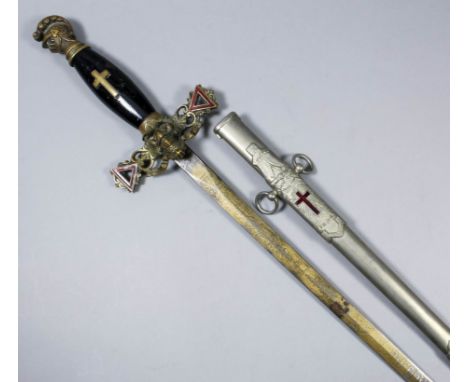 An American Knights Templar Society sword, the etched blade bearing the name of Guy Peck, the brass hilt bearing the emblems 