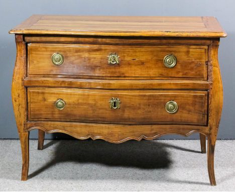 An 18th Century Continental fruitwood commode of slightly serpentine outline, the plain top with moulded edge, fitted two lon