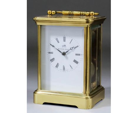 A modern carriage clock by Matthew Norman, the white enamel dial with Roman numerals to the eight day two train movement stri