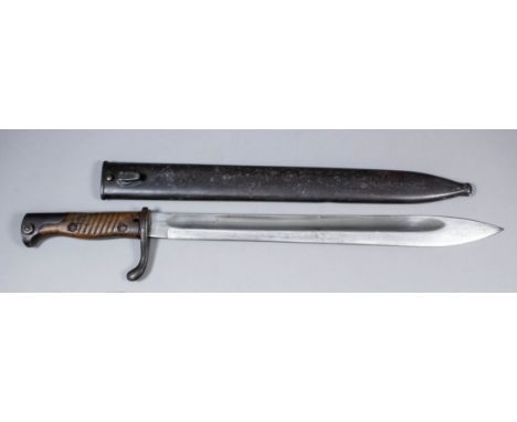 A good World War I German butcher bayonet by Carl Eickhorn, with 14ins bright steel blade, wooden grip and original metal sca