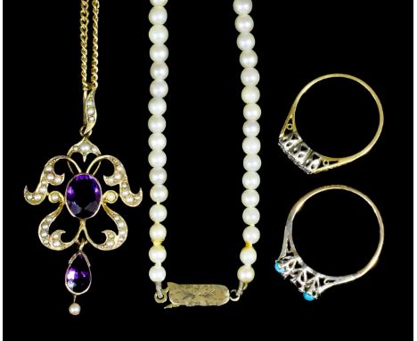 An Edwardian gold coloured metal mounted amethyst and and seed pearl set pendant, the central oval cut amethyst of approximat