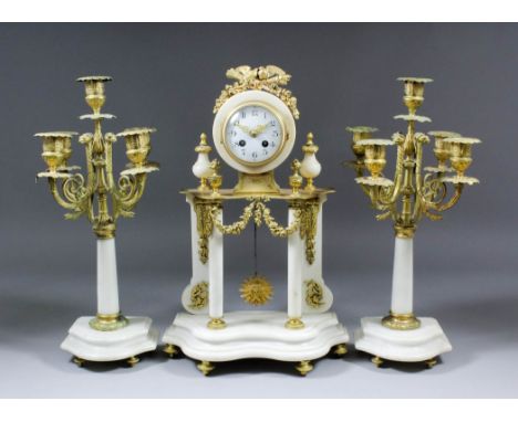 A late 19th Century French gilt brass and white marble three piece clock garniture, the clock by A.D. Mougin, No. 1625 92, th