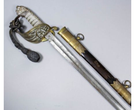 An English 1897 pattern Naval Officers dress sword by Friedberg of Portsea, the bright steel blade etched with crown over anc