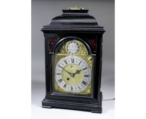 An early 18th Century ebonised table clock by George Thatcher of Cranbrook, the 7ins arched brass dialwith matted dial centre