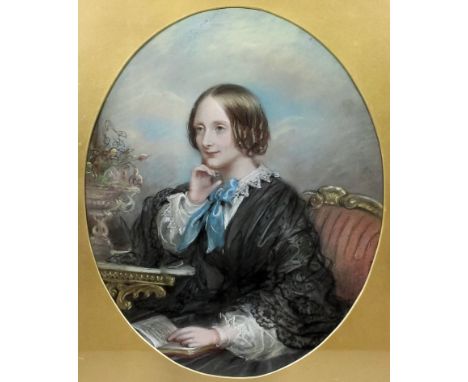 19th Century English School - Pastel - Half-length portrait of a woman wearing a blue bow reading at a console table, oval 11