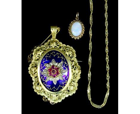 A modern Indian 18k gold ruby, diamond and enamel set oval pattern pendant or brooch at will, the face set with a ruby and di