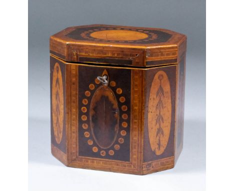 A George III inlaid octagonal single division tea caddy, the lid with circular panel and the sides with differing oval panels