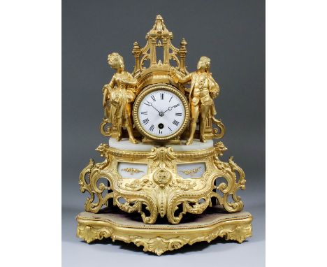 A late 19th Century French gilt metal and alabaster mantel timepiece, the 3ins diameter white enamel dial with Roman numerals