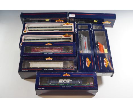 Twelve boxed Bachmann large rolling stock and two boxed carriages