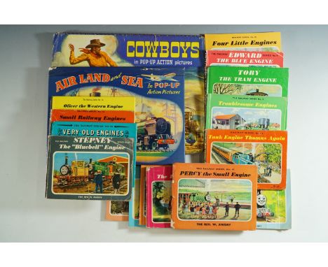 A quantity of "Thomas the Tank Engine" books and two mid-20th Century children's pop-up books