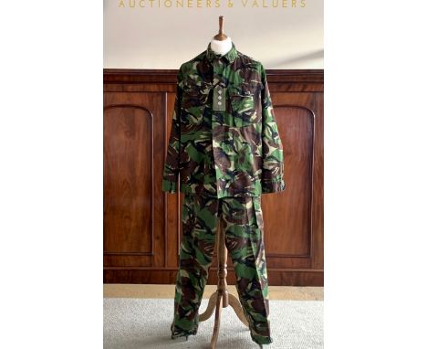 A British Army Chaplain's camouflage jacket and trousers