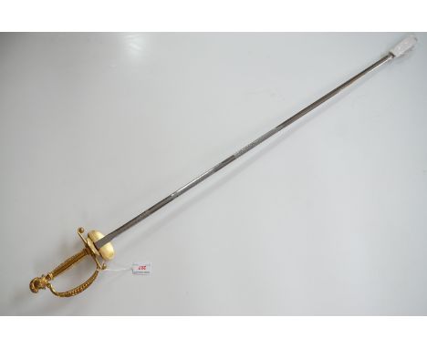A Wilkinson Sword court sword, having ornate gilt metal hilt and etched blade