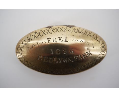A Victorian brass pocket snuff box stamped "Fred, 1896, Bedlywn Farm"