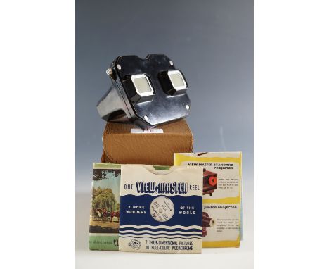 A cased Viewmaster slide projector and slides