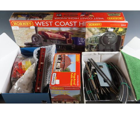 Hornby model railway "West Coast Highlander Train Set" with extra track, Kings Arms Public House, etc.