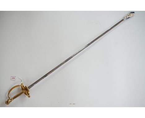 A Wilkinson Sword court sword, having ornate gilt metal hilt and etched blade