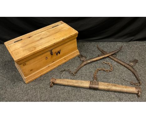 A striped pine plank top trunk, 32.5cm high, 64.5cm long, 31.5cm deep;  a pair of Hames;  a scale beam/balance bar (4) 