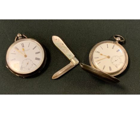 A Victorian silver hunter cased pocket watch, signed W Eberhardt, London to the movement, white enamel dial, bold Roman numer