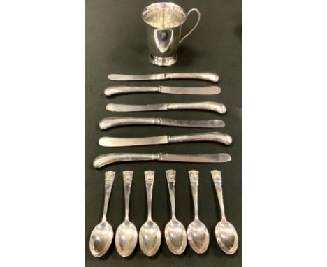 An Elizabeth II silver christening cup, Sheffield 2002;  six coronation spoons, 136g;  set of six silver hafted knifes 