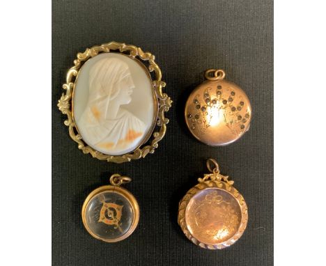A Victorian cameo brooch, Madonna, gilt metal mount, 5.5cm x 50cm;  rolled gold locket;  another;  compass (4) 