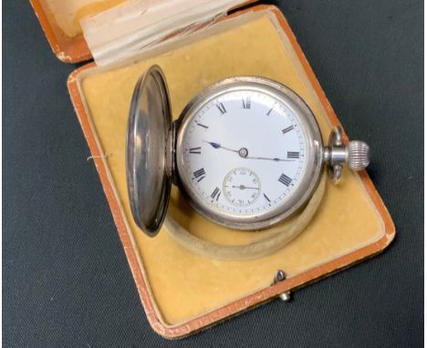 A George V silver engine turned hunter cased pocket watch, white enamel dial, bold Roman numerals, subsidiary seconds,  blue 