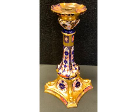 A Royal Crown Derby Imari 1128 pattern Castleton candlestick, dolphins to angles, 27cm high, first quality 