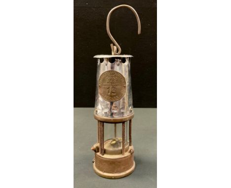 An Eccles ‘Protector lamp and lighting company’ miners lamp, type GR6S, no 13, 33cm high overall. 