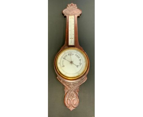 An Art Nouveau carved cased aneroid Barometer Thermometer, 84cm high 