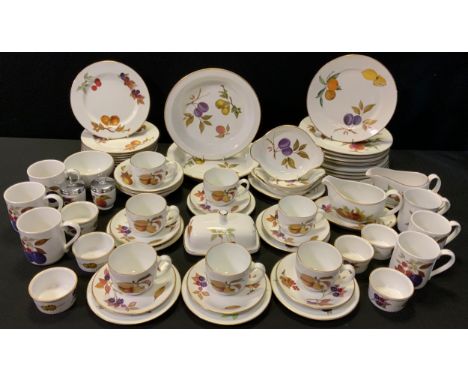An extensive Royal Worcester Evesham dinner and tea service, inc dinner plates, side plates, gravy and sauce boats on stands,