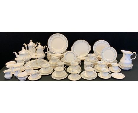 An extensive Royal Albert Memory Lane pattern dinner and table service inc dinner side, dessert plates, coffee port, teapot a