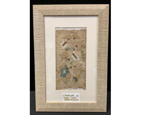 A possibly 17th century/ Charles I floral needlework panel, woven in tones of green, white, cream and brown, 22cm x 11cm 