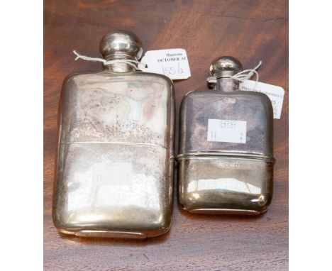 Two silver hip flasks, one hallmarked for London 1901, the other hallmarked for Sheffield 1921, total weight 348 grams/11.19 