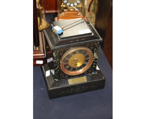 A Victorian black slate and marble mantle clock with a black chapter dial and gilt numerals. a/f.