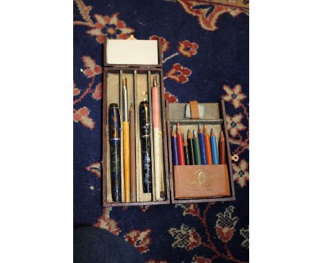 A marbled plastic Conway Stewart fountain pen with 14ct gold nib and another marbled cased fountain pen a/f with 14ct nib, wi