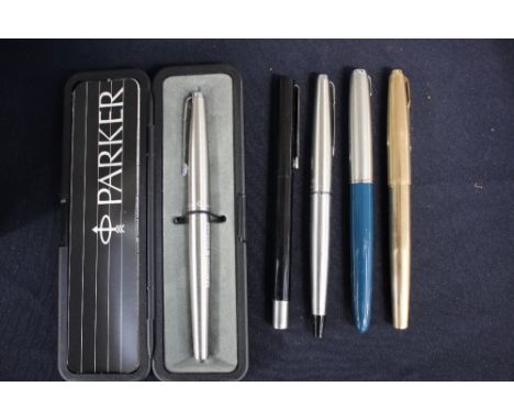 A cased parker fountain pen (from Hawker Siddeley) with guarantee, silvered metal casing covered nib, a golden metal casing P