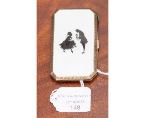 A sterling silver and enamel ladies cigarette case, gilt with engine turned decoration, import marks for London 1929 sponsor'