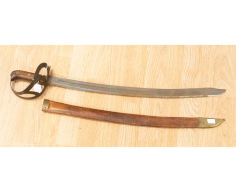 A Milsco sword by the Milwaki Saddle Company, having original leather scabbard, with brass tip, wooden hilt with brass rivets