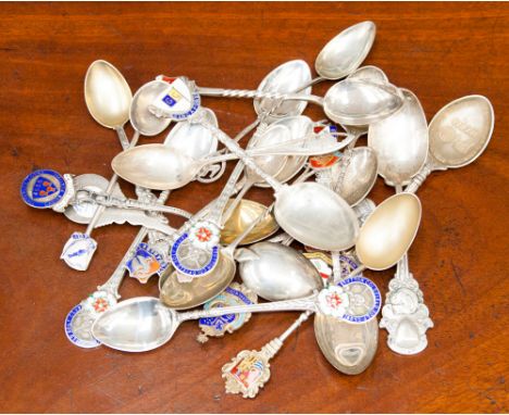 A collection of sterling silver souvenir spoons to include Singapore, Sutton Coldfield Gold Club and Hampshire Automobile Clu