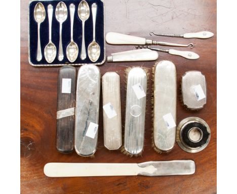 A mixed lot to include a cased set of sterling silver teaspoons with golfing interest terminals, a silver mounted page turner