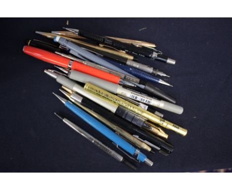 A Parker ball point pen, Three Cross 22ct gold plated ball points, a Paul Classic gold plated ball point (U.S.A.) chromatic b