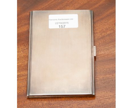 A George VI sterling silver engine turned cigarette case with sprung lid, marked for Birmingham 1947 W N & S Ltd, length 12 c