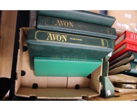 Four stamp albums containing Olympic stamps dating from 1924 France.