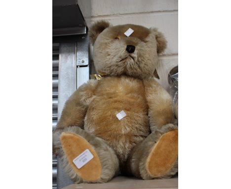 A Chiltern jointed teddy measuring approximately 65 cms high.