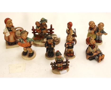 Nine Goebel Hummel figures. (9)