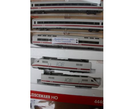 Fleischmann HO 4440 set, and three associated coaches, boxed.
