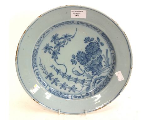 An English Delft blue and white charger, circa 1760, possibly William Griffith of Lambeth High Street pottery

Note: see Daws