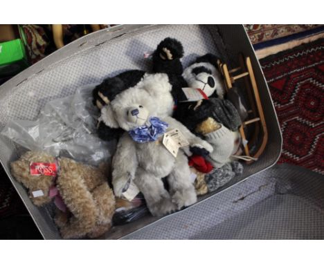 A Hermann 'Grisly Bear', grey, a Panda 'Clemens' Bear, 'Hermann' Bear Sleigh Ride with Dog, a 'Hermann' Good Luck Bear (chimn